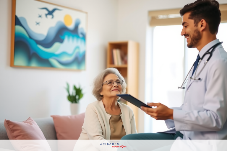 A young doctor examining an elderly woman in a comfortable living room setting. The doctor is seated, holding her medical chart while smiling, as the older woman sits nearby on a couch, looking calm and at ease.